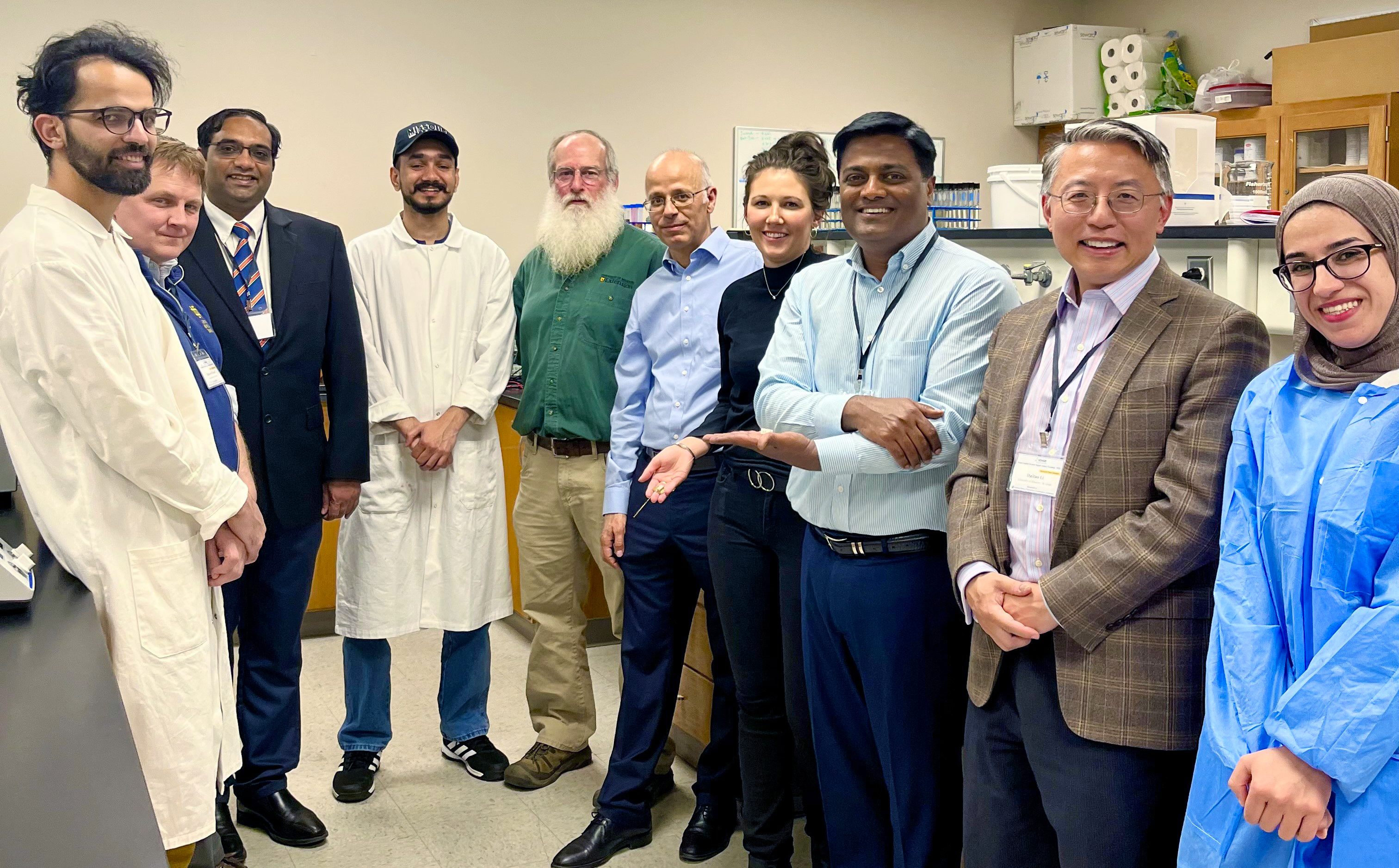 Our researchers standing in a lab